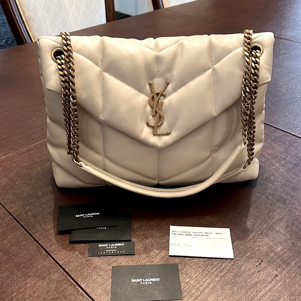 Saint Laurent Medium Puffer in Quilted Lambskin in new condition!!